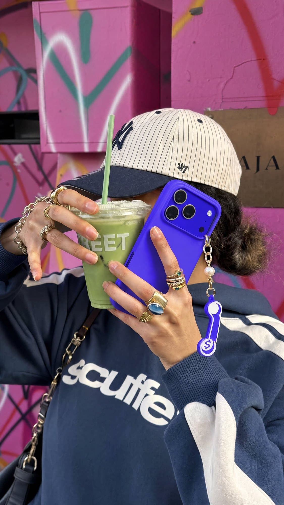 A creator checking DialMe on her phone